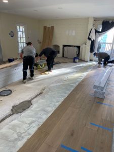 The team of contractors doing Flooring Installation